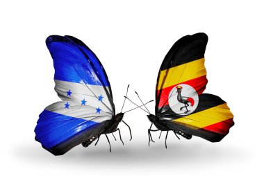 Kelebek kanatları üzerinde honduras ve uganda bayrağı ile