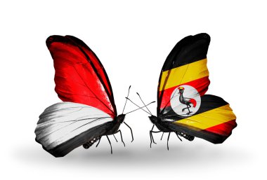 Kelebek kanatları üzerinde monaco, Endonezya ve uganda bayrağı ile