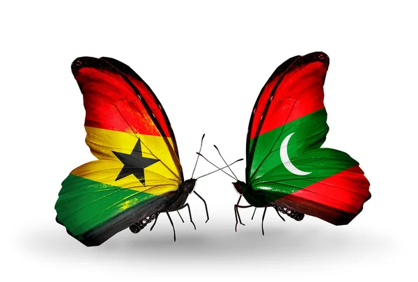 Papillons avec drapeaux Ghana et Maldives sur les ailes — Photo