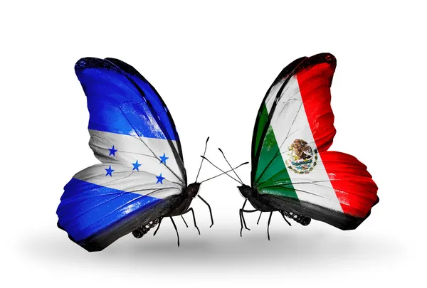 Borboletas com bandeiras de Honduras e México em asas — Fotografia de Stock