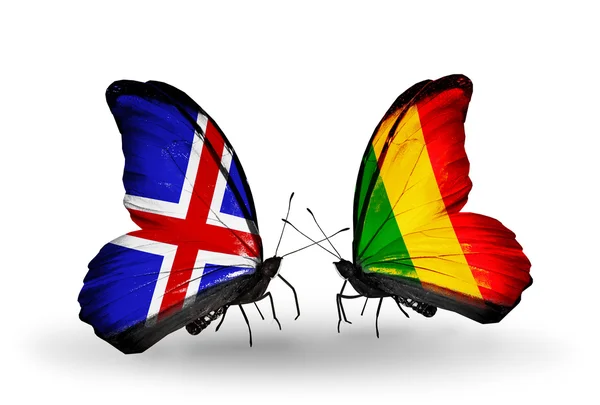 Butterflies with Iceland and Mali flags on wings — Stock Photo, Image