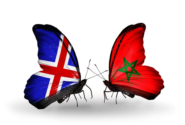 Butterflies with Iceland and Morocco flags on wings — Stock Photo, Image