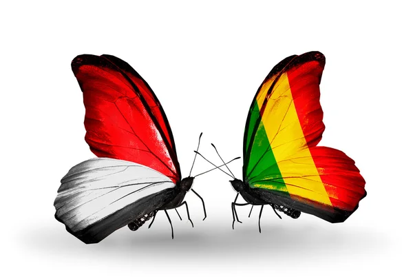 Butterflies with Monaco, Indonesia and Mali flags on wings — Stock Photo, Image