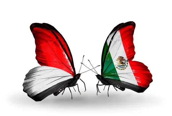 Papillons avec des drapeaux Monaco, Indonésie et Mexique sur les ailes — Photo