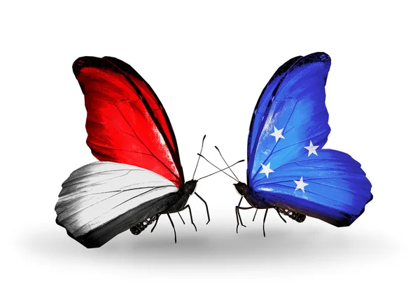 Mariposas con banderas de Mónaco, Indonesia y Micronesia en alas — Foto de Stock