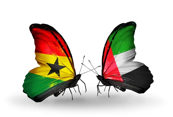 Butterflies with Ghana and  United Arab Emirates flags on wings — Stock Photo, Image