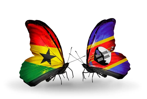 Papillons avec drapeaux Ghana et Swaziland sur les ailes — Photo