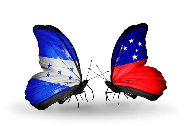 Mariposas con banderas de Honduras y Samoa en alas — Foto de Stock