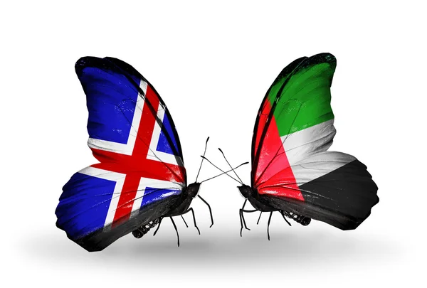 Motyle z Islandii i Zjednoczone Emiraty Arabskie flagi na skrzydłach — Zdjęcie stockowe