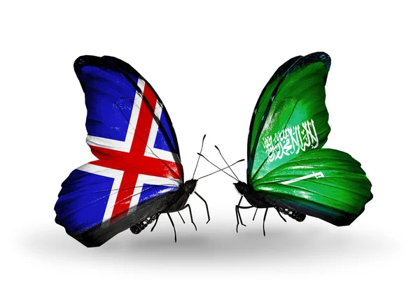 Butterflies with Iceland and Saudi Arabia flags on wings — Stock Photo, Image