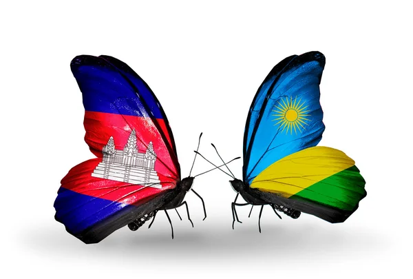 Papillons avec drapeaux Cambodge et Rwanda sur les ailes — Photo