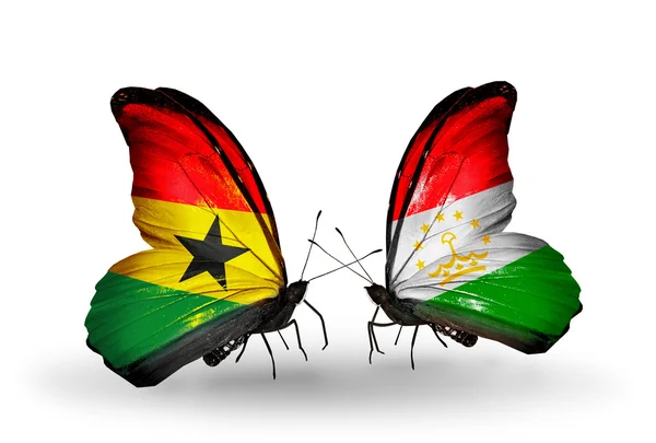 Motyle z Ghany i Tadżykistan flagi na skrzydłach — Zdjęcie stockowe