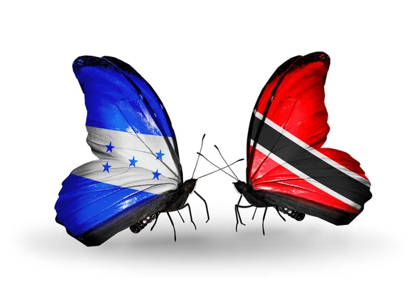 Butterflies with Honduras and  Trinidad and Tobago flags on wings — Stock Photo, Image