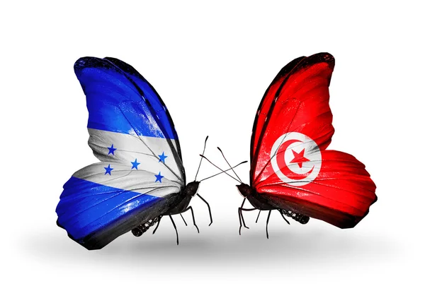 Papillons avec drapeaux Honduras et Tunisie sur les ailes — Photo