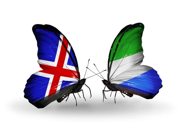 Butterflies with  Iceland and Sierra Leone flags on wings — Stock Photo, Image