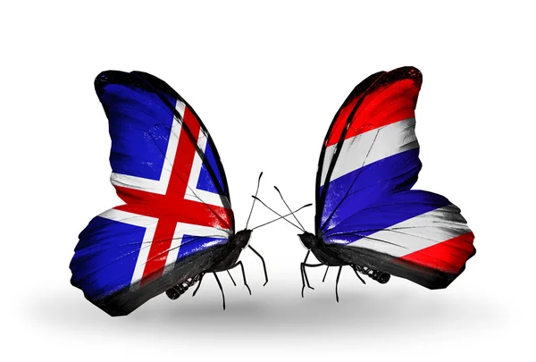 Schmetterlinge mit Island und Thailand Flaggen am Flügel — 图库照片