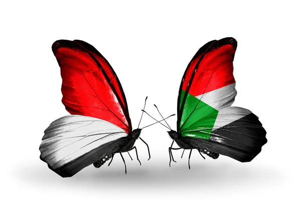 Mariposas con banderas de Mónaco, Indonesia y Sudán en alas — Foto de Stock