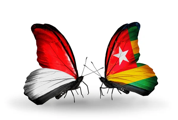 Butterflies with Monaco, Indonesia and Togo flags on wings — Stock Photo, Image