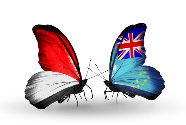 Butterflies with Monaco, Indonesia and Tuvalu flags on wings — Stock Photo, Image