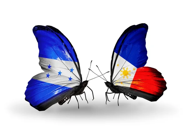 Butterflies with Honduras and  Philippines flags on wings — Stock Photo, Image