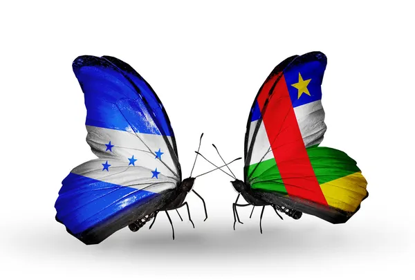 Mariposas con banderas de Honduras y República Centroafricana en alas — Foto de Stock