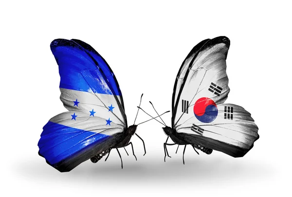 Butterflies with Honduras and  South Korea flags on wings — Stock Photo, Image