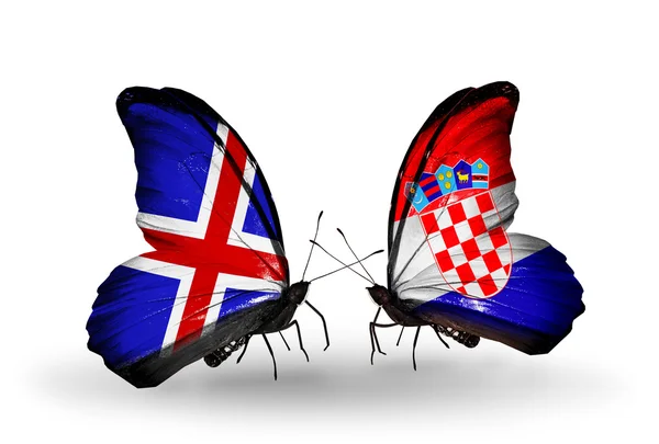 Papillons avec des drapeaux Islande et Croatie sur les ailes — Photo