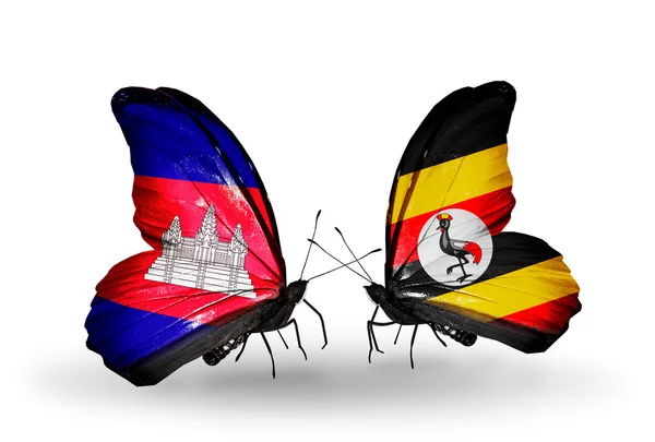 Papillons avec drapeaux Cambodge et Ouganda sur les ailes — Photo
