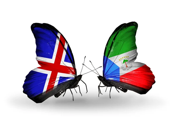 Butterflies with Iceland and Equatorial Guinea flags on wings — Stock Photo, Image