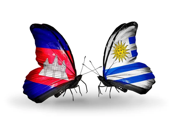 Papillons avec drapeaux Cambodge et Uruguay sur les ailes — Photo