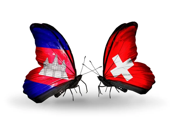 Kelebek kanatları üzerinde İsviçre ve Kamboçya bayraklı — Stok fotoğraf