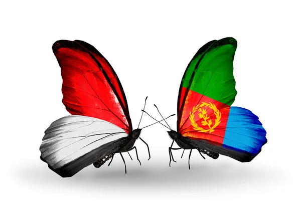 Butterflies with Monaco, Indonesia and Eritrea flags on wings — Stock Photo, Image