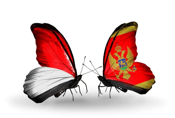 Kelebek kanatları üzerinde monaco, Endonezya ve Karadağ bayraklı — Stok fotoğraf