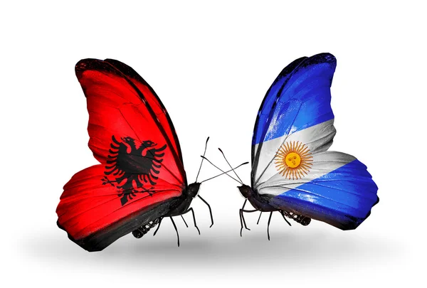 Butterflies with Albania and Argentina flags — Stock Photo, Image