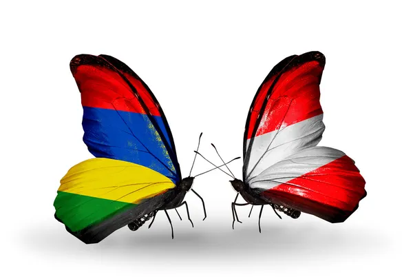 Mariposas con banderas de Mauricio y Austria —  Fotos de Stock