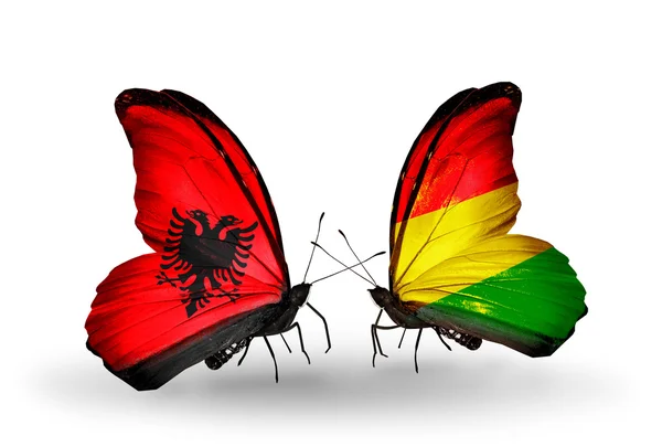 Mariposas con banderas de Albania y Bolivia — Foto de Stock