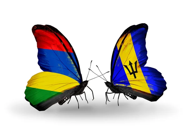 Schmetterlinge mit Mauritius- und Barbados-Fahnen — Stockfoto