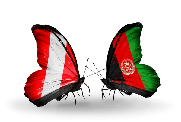 蝴蝶与秘鲁和阿富汗国旗 — 图库照片