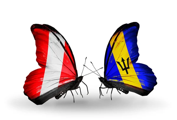 Butterflies with Peru and Barbados flags — Stock Photo, Image