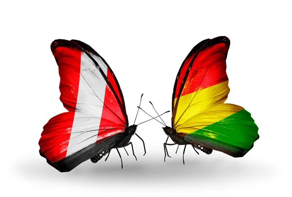 Butterflies with Peru and Bolivia flags — Stock Photo, Image