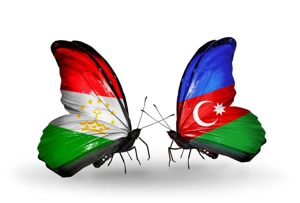 Mariposas con banderas de Tayikistán y Azerbaiyán — Foto de Stock