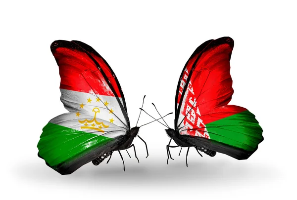 Butterflies with Tajikistan and Belarus flags — Stock Photo, Image