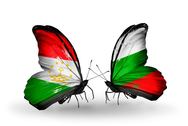 Butterflies with Tajikistan and Bulgaria flags — Stock Photo, Image