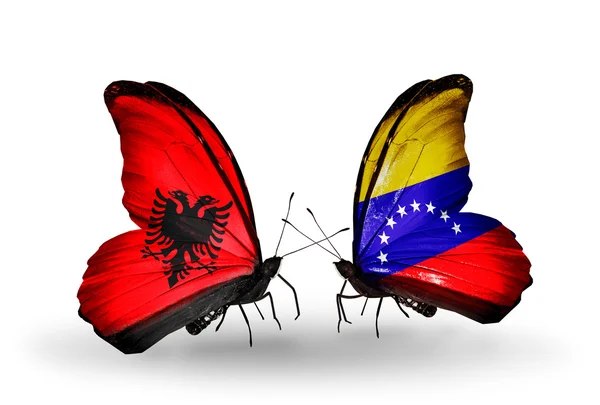 Butterflies with Albania and Venezuela flags — Stock Photo, Image