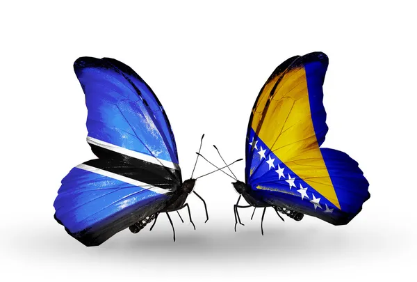 Mariposas con banderas de Botswana y Bosnia y Herzegovina — Foto de Stock
