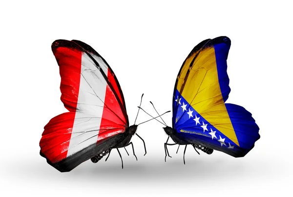 Butterflies with Peru and Bosnia and Herzegovina flags — Stock Photo, Image