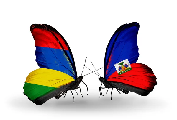 Mariposas con banderas de Mauricio y Haití —  Fotos de Stock