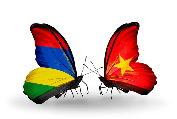 Butterflies with Mauritius and Vietnam flags — Stock Photo, Image