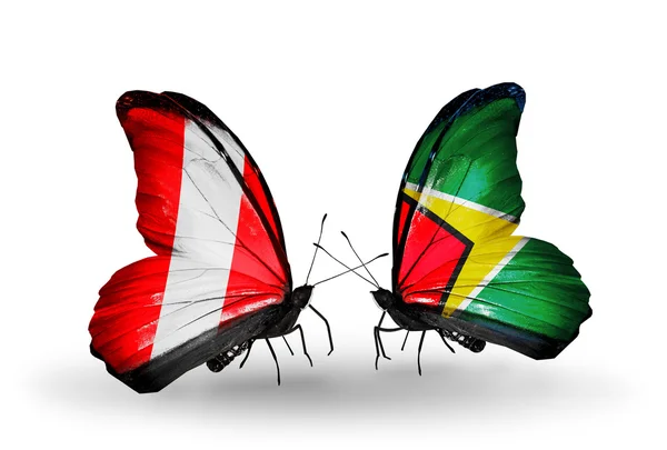 Mariposas con banderas de Perú y Guyana — Foto de Stock
