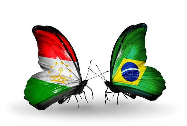Butterflies with Tajikistan and Brazil flags — Stock Photo, Image
